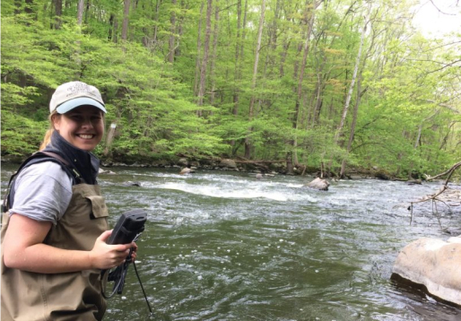 scientist in creek